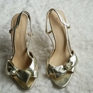 Kate Spade gold heels shoes. Size 7.5. Gold.